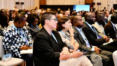 Claudia Olavarria, Feminist Evaluation Consultant at the Global Evaluation Initiative, during the 2024 NEC Conference in Beijing